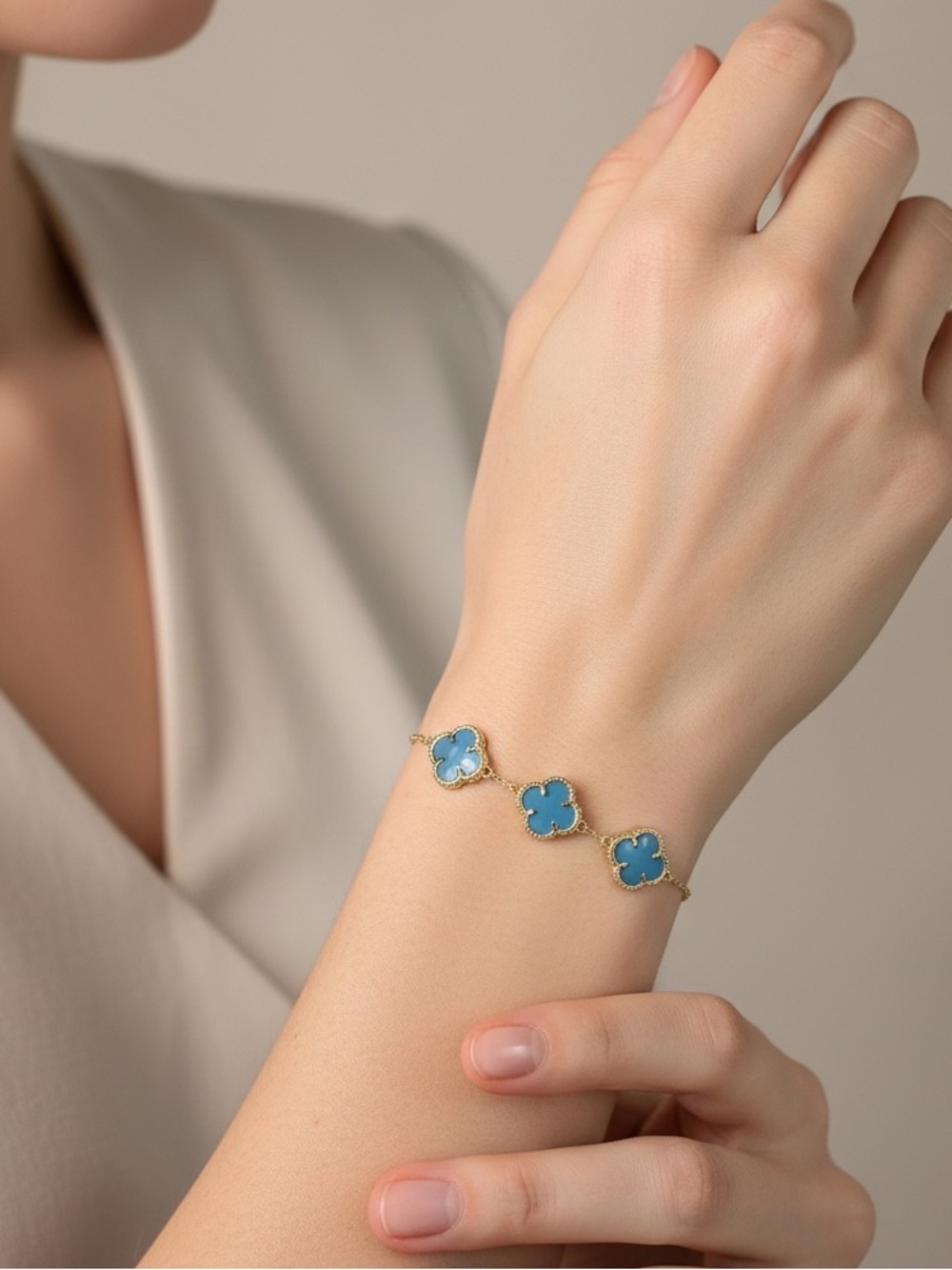New STELLA ROSE Gold Plated Bracelet 
Blue Clover Accents 
7 - 7.25”